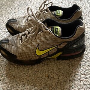 Nike Air Sneakers with Yellow and Black Accents